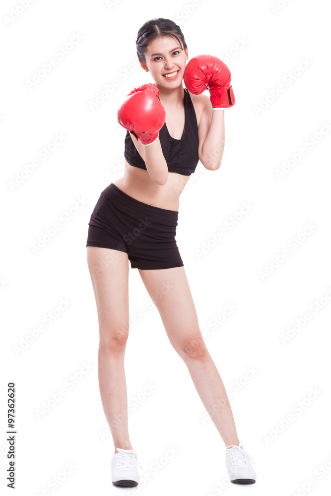 Full length fitness woman with the red boxing gloves Full length fitness woman with the red boxing gloves