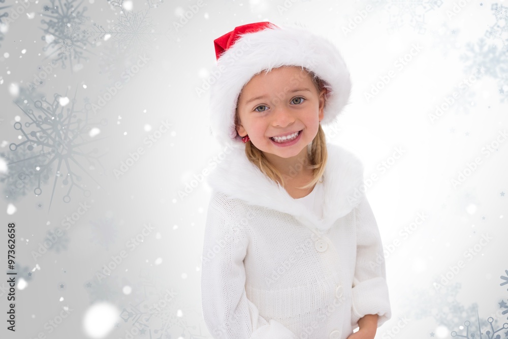 Composite image of cute little girl wearing santa hat Composite image of cute little girl wearing santa hat