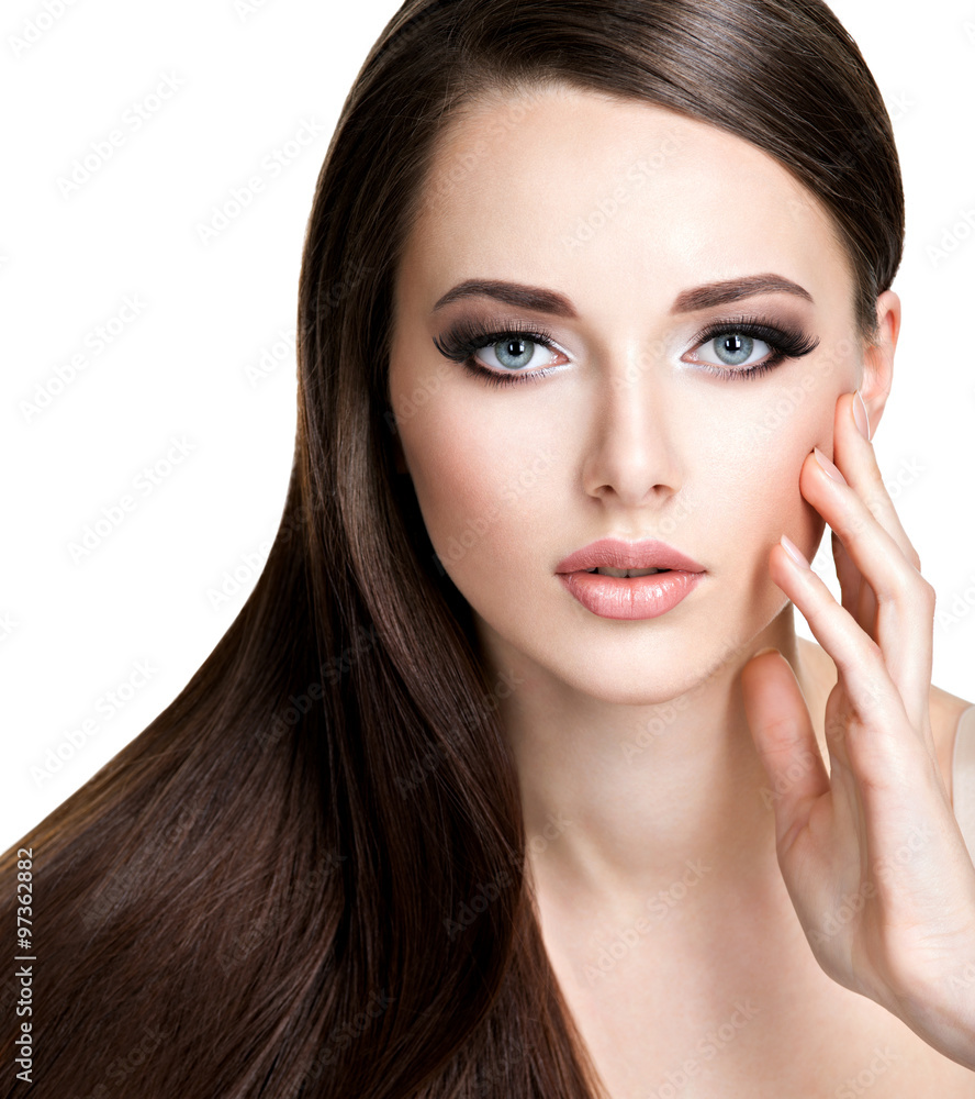 Portrait of beautiful young woman with long straight brown hair Portrait of beautiful young woman with long straight brown hair