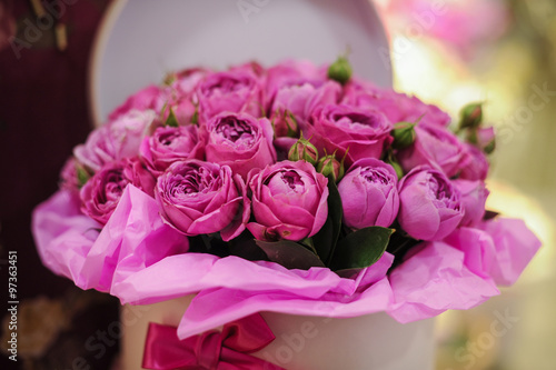 big bright pink roses bouquet in round box
