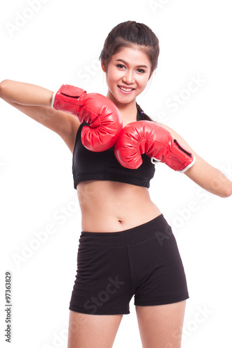 Boxer - Full length fitness woman boxing wearing boxing gloves on white background. © japhoto