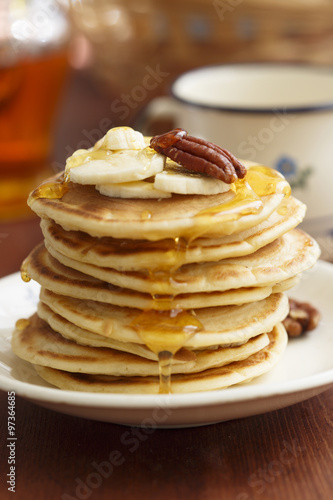 Buttermilk pancakes with banana and pecan