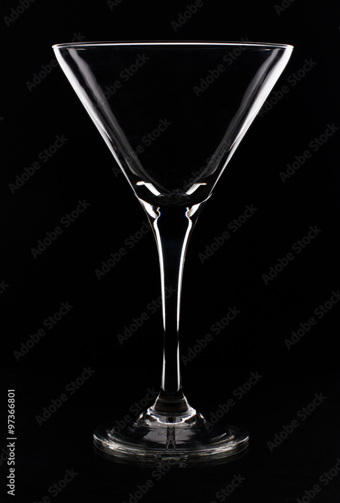 contour empty glass, silhouette in light on a black background contour empty glass, silhouette in light on a black background