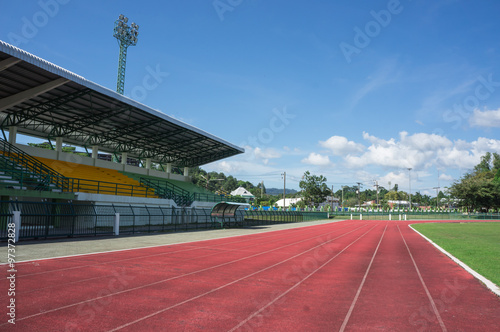 grandstand, race track , football field with blue sky