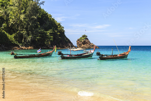Traditional thai longtail boat at famous sunny Long Beach © Naypong Studio