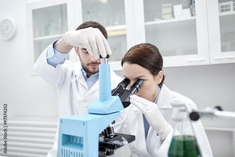 young scientists making test or research in lab young scientists making test or research in lab