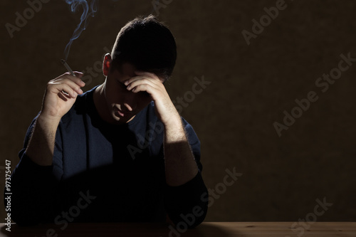 Smoking because of a problem photo