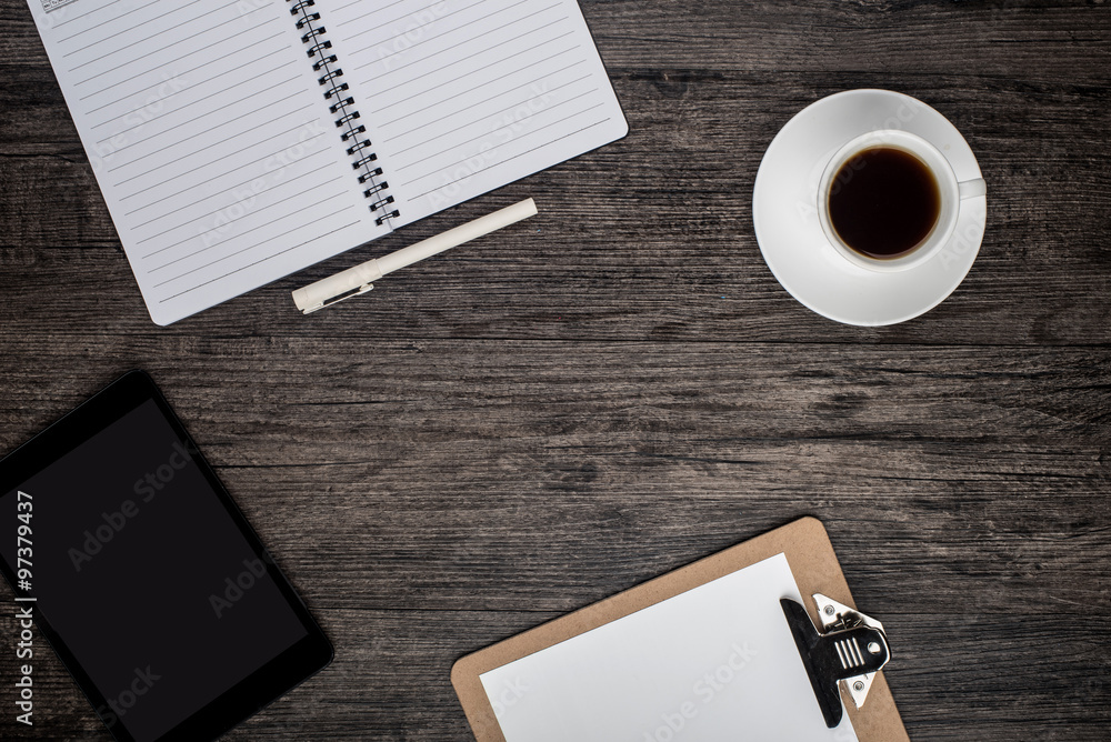 Office desk with laptop computer, planner, mobile smartphone and coffee cup. Office desk with laptop computer, planner, mobile smartphone and coffee cup.