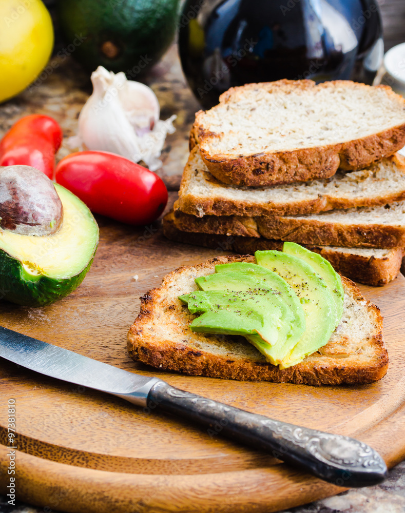 toast with fresh avocado and pepper, healthy snack, vegetarian f toast with fresh avocado and pepper, healthy snack, vegetarian f