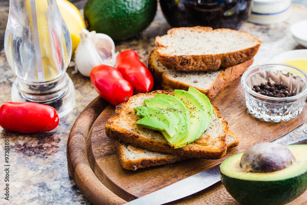 toast with fresh avocado and pepper, healthy snack, vegetarian f