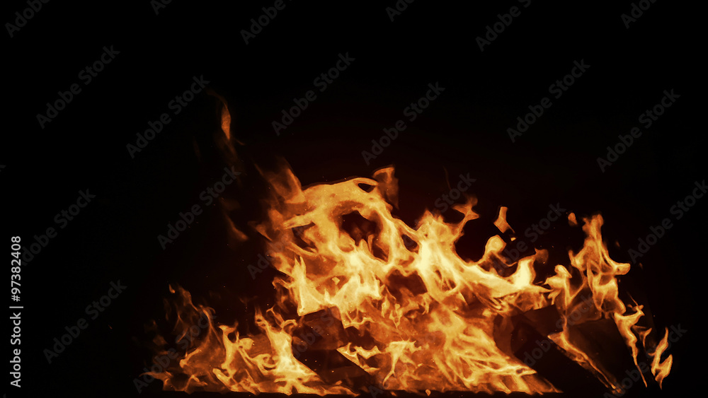 Real big shot fire with particles on black background, perfect for film, digital composition Real big shot fire with particles on black background, perfect for film, digital composition