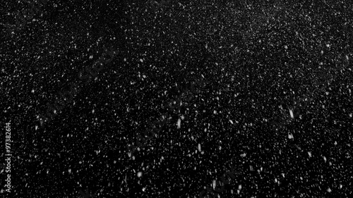 Fotografie, Obraz Falling realistic natural snowflakes from top to bottom, calm snow, perfect for