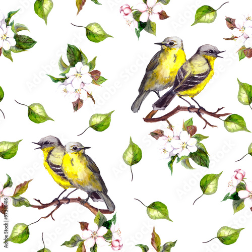 Seamless background with couple of song birds with spring flowers