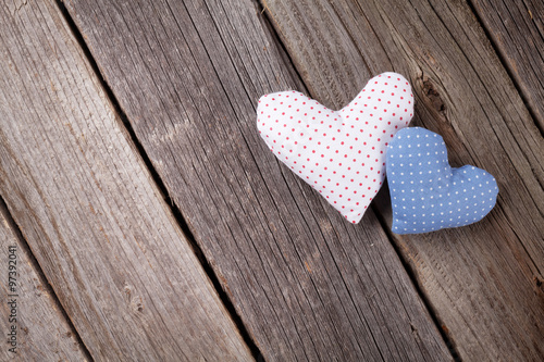 Fototapeta Naklejka Na Ścianę i Meble -  Valentines day toy hearts on wood
