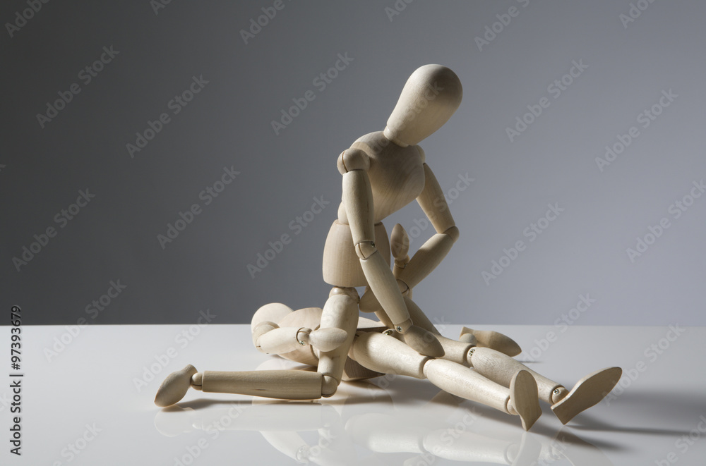 two wooden figures