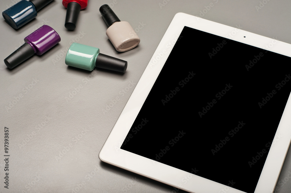 White tablet computer with nail polish White tablet computer with nail polish