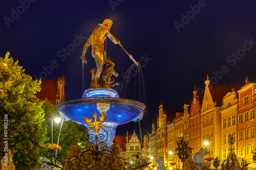Fountain of Neptune in Gdansk at night, Poland