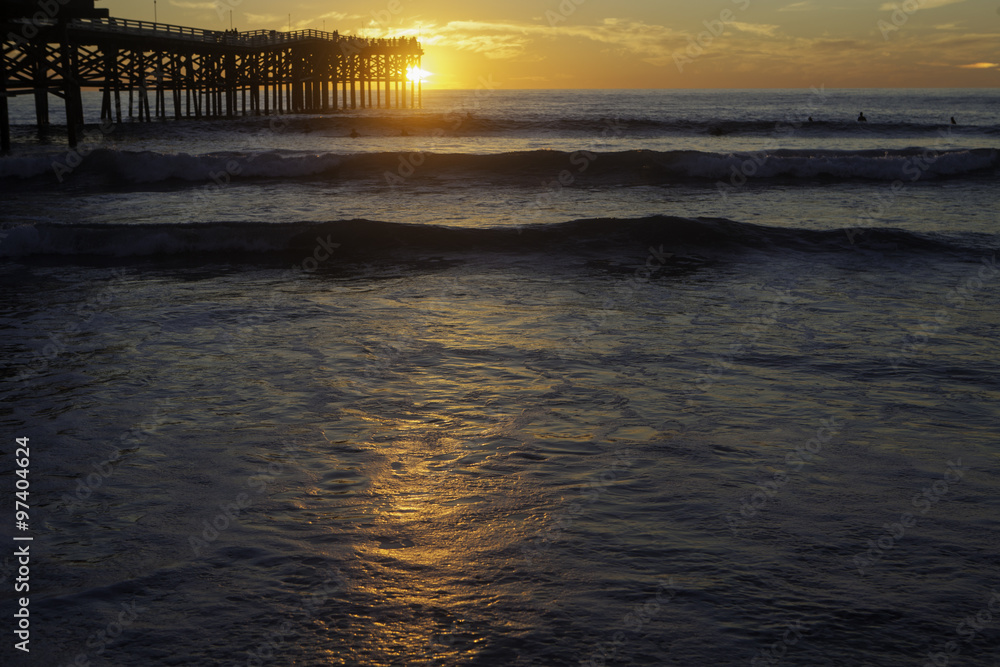 Naklejka premium sunset at pacific beach pier