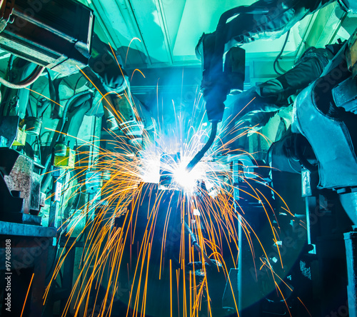 Robot welding movement Industrial automotive part in factory