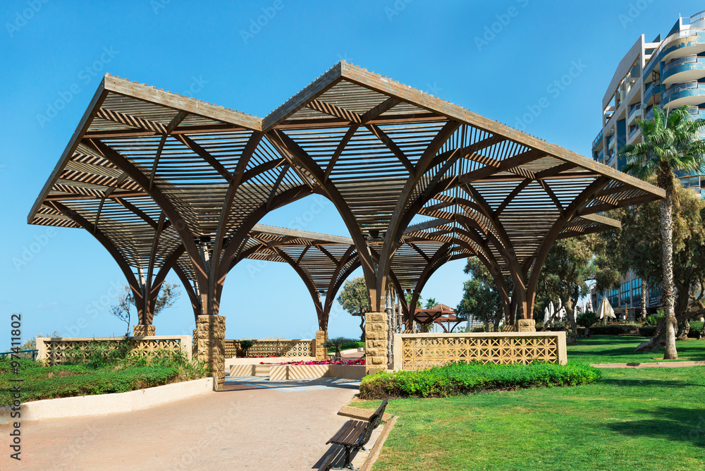 Wooden pergolas on the promenade Wooden pergolas on the promenade