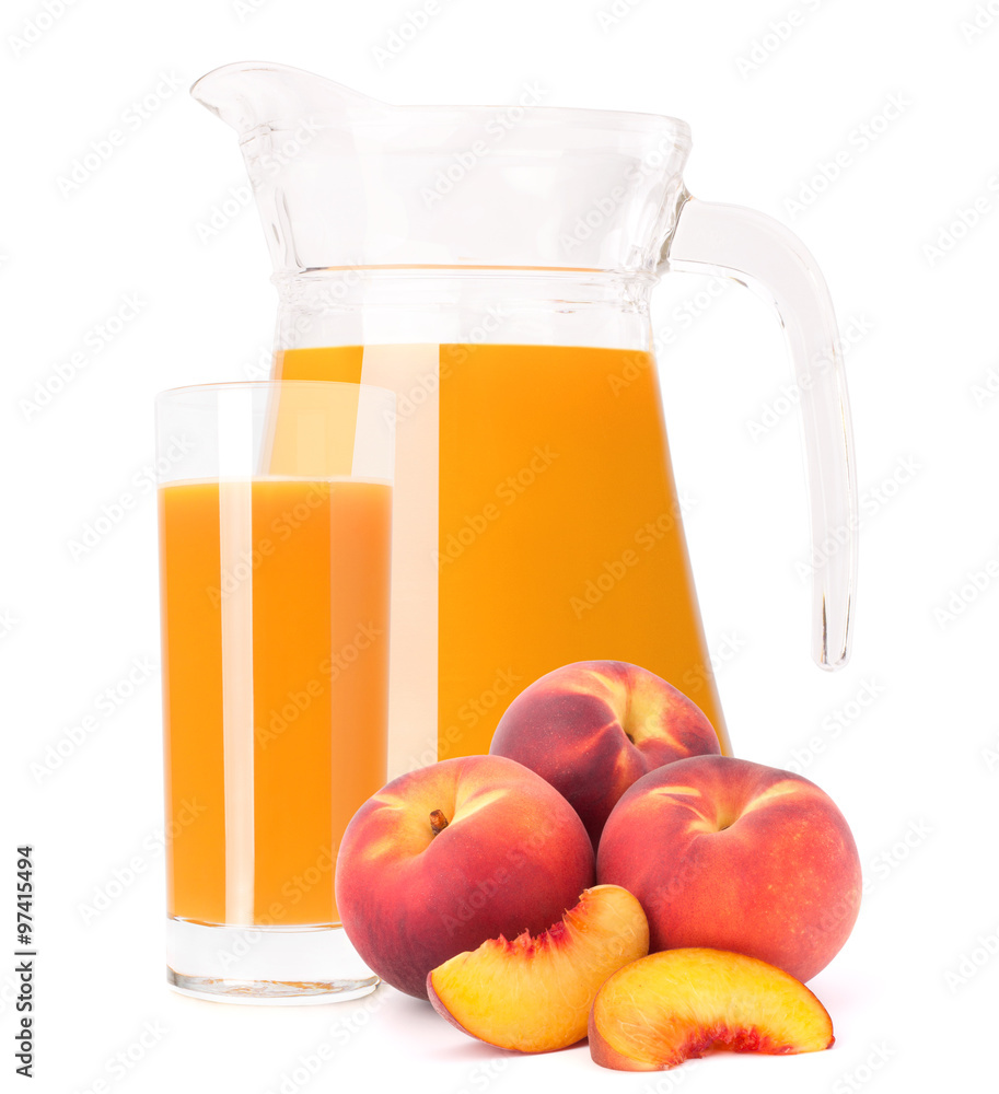 Peach fruit juice in glass jug Peach fruit juice in glass jug