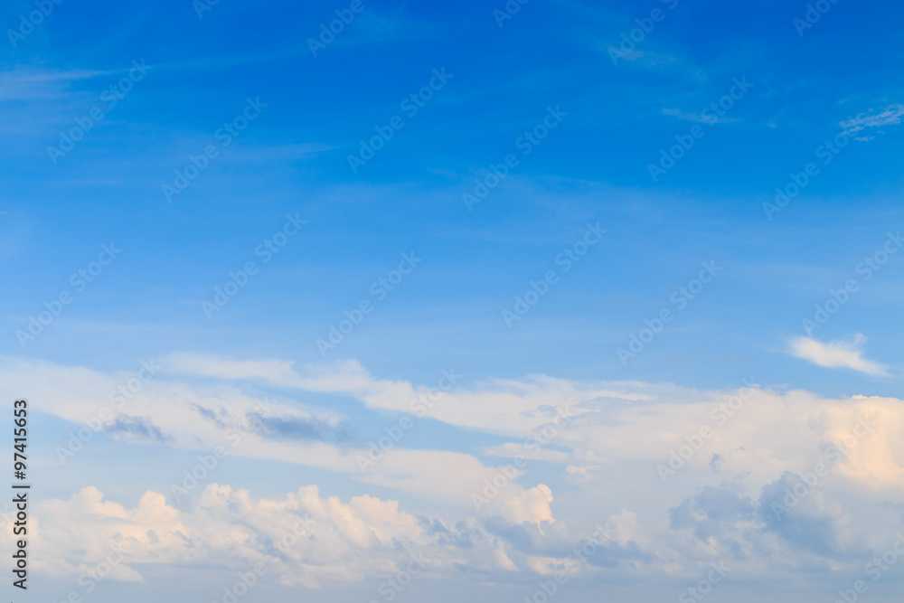 Blue sky background with tiny clouds Blue sky background with tiny clouds