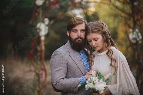 beard man and nice woman in the wood