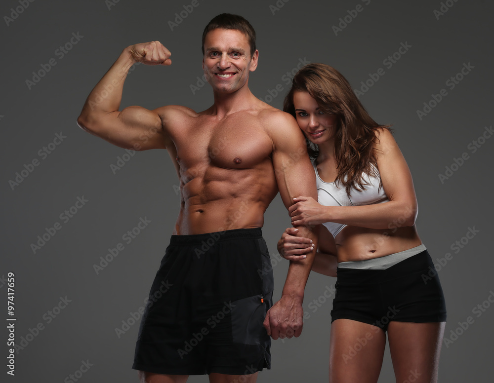 Muscular guy and slim attractive woman. Muscular guy and slim attractive woman.