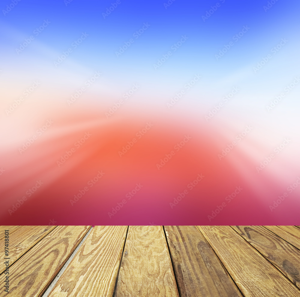 Empty wood table over blurred beautiful bokeh sunset background, product display template,deck