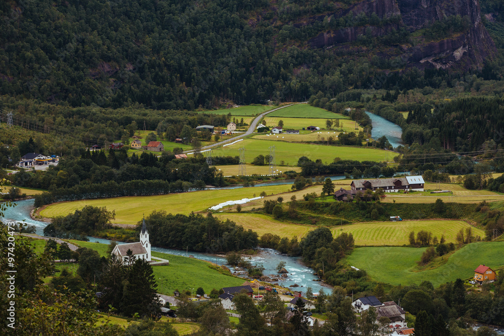 Obraz premium Large view over a typical village located in a valley somewhere in Norway, Europe