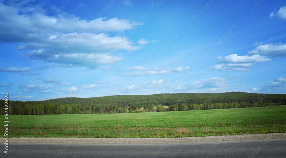 Landscape with road, forest, river and blue sky Landscape with road, forest, river and blue sky