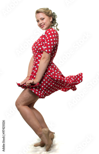 Girl in a red polka dot dress