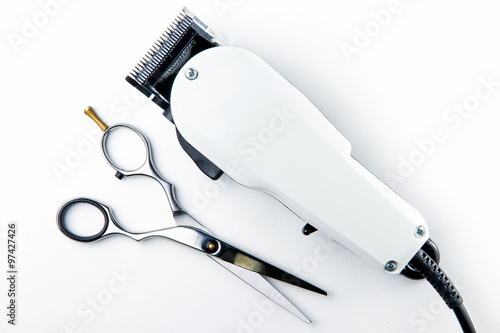 hair cutting scissors and hair clippers for hairdressers. photo