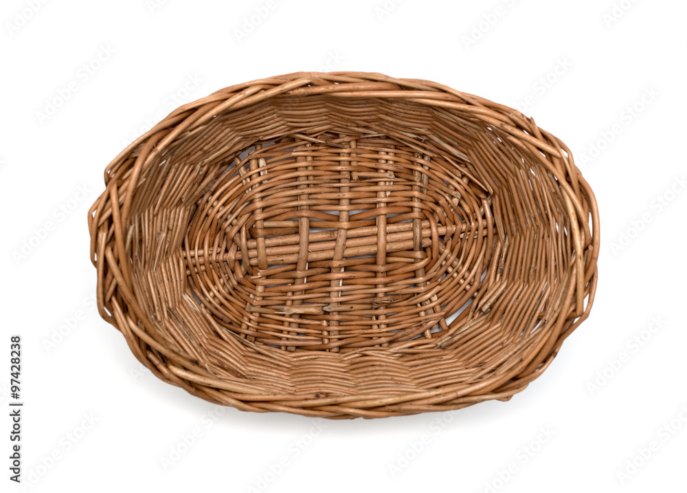 Fototapeta premium wicker basket on a white background