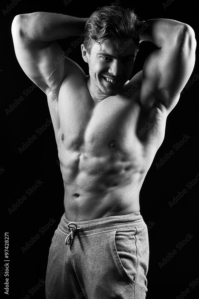 Sexy muscular fitness man. Black and white image. Stock Photo | Adobe Stock