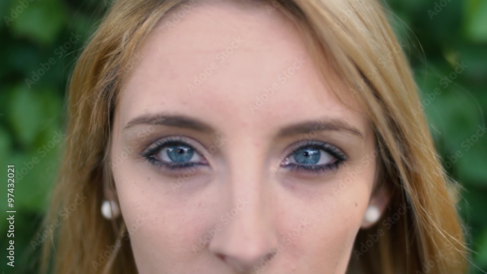 Close up of female blue eyes. Handheld shot in 4K
Close up of female blue eyes. Handheld shot in 4K