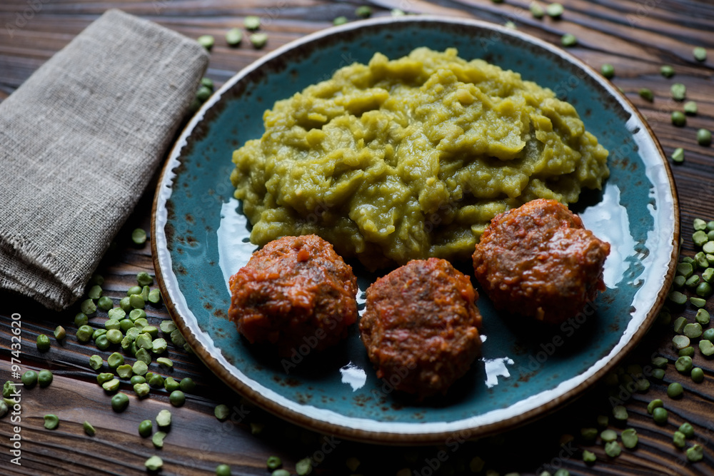 Meatballs served with green peas, selective focus, closeup Meatballs served with green peas, selective focus, closeup