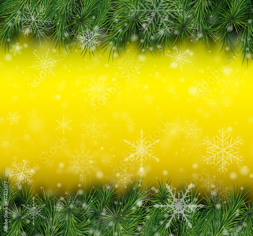 Christmas background with fir branches and snowflakes