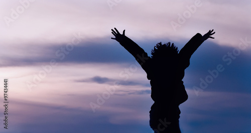 Silhouette of a boy jumping 