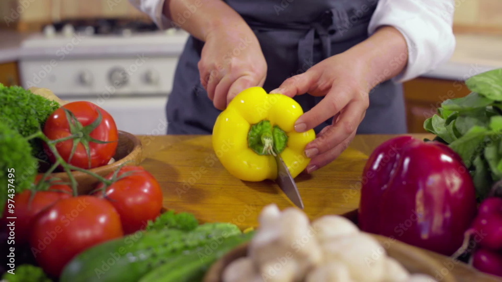 chef carving a fresh pepper slow motion chef carving a fresh pepper slow motion