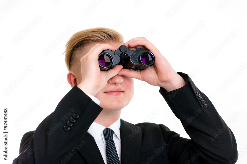 business man is looking through binoculars business man is looking through binoculars