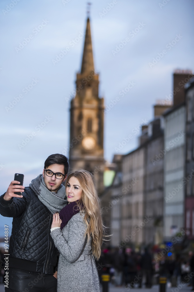 Fototapeta premium Attractive young couple making selfie