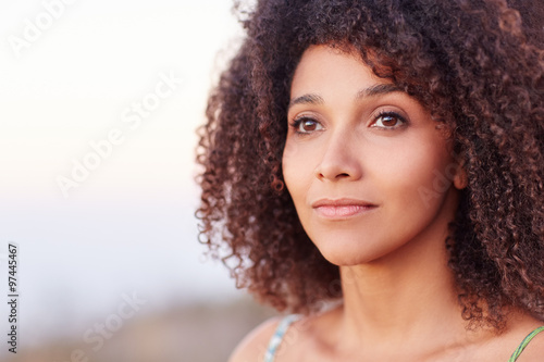 Closeup of a beautiful woman looking into the distance