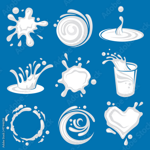 white splashes of milk on blue background