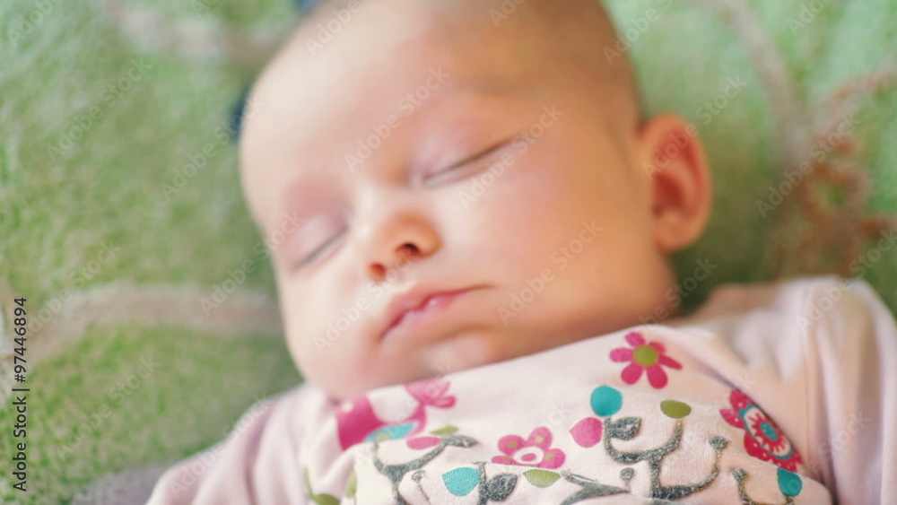 precious newborn baby is laying on a comfortable bed, sleeping peacefully
precious newborn baby is laying on a comfortable bed, sleeping peacefully