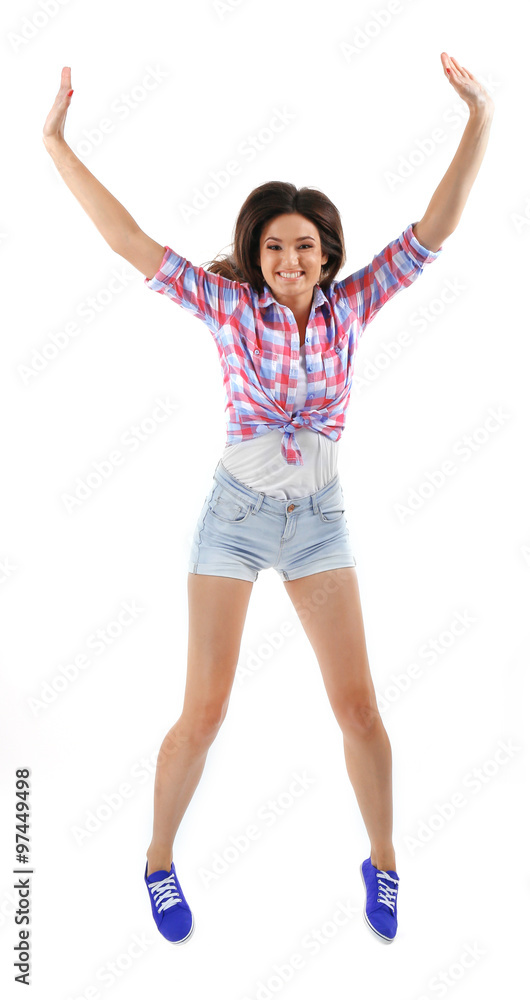 Active girl jumping in joy, isolated on white Active girl jumping in joy, isolated on white