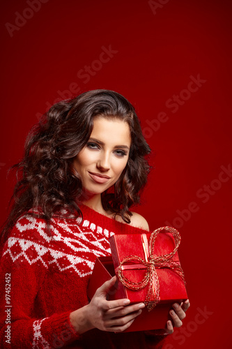 Woman with christmas box gift © ZoomTeam
