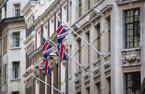 LONDON UK - SEPTEMBER 19, 2015 - British flag on the building facade. City of London  photo