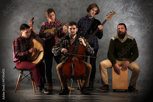 Photography Musical band on grey wall background