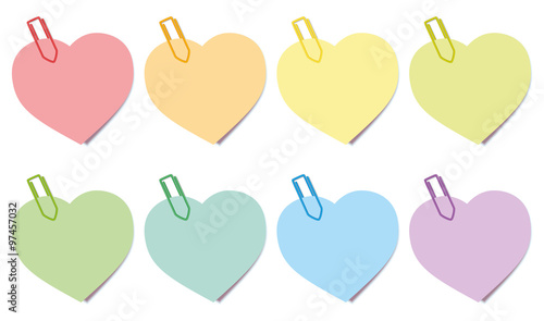 Sticky notes - heart shaped colored notepads with paperclips. Isolated vector illustration over white background.
